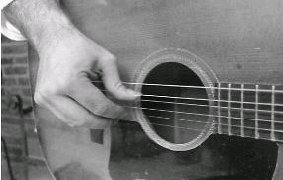 Geoff's hand on strings